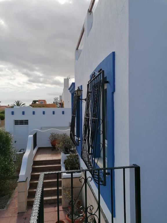 Blue and white terraces and steps of the house